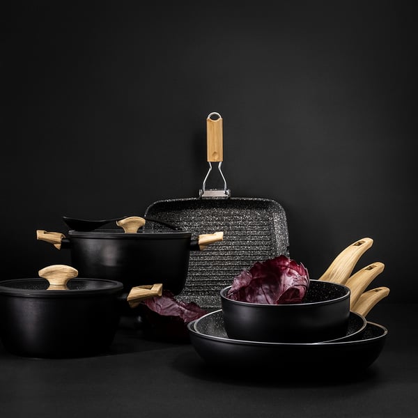 Black cookware set with wooden handles and lids. Includes pots, pan, and lid rest. Non-stick coating for easy cleaning.