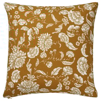 Square mustard yellow throw pillow with white floral pattern.