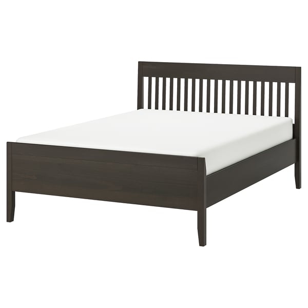 A sleek, modern IDANÄS bed in dark brown wood with a slatted headboard and footboard, supporting a white mattress.