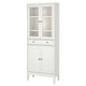 White IDANÄS cabinet with glass doors, solid wood, sleek design. Top glass, bottom solid. Displays items.