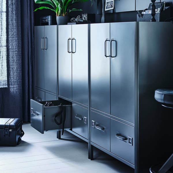 Modern grey metal IDÅSEN cabinet with drawers and locks, sleek design, perfect for workspace.
