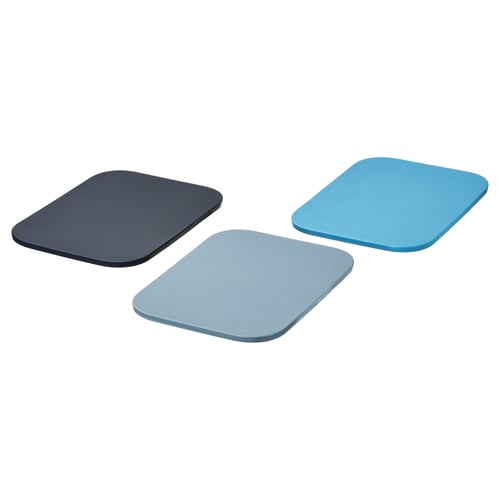 Three rectangular plastic chopping boards in black, light blue, and dark blue colours arranged diagonally.