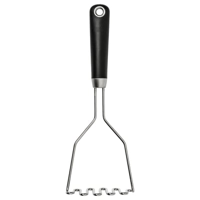 Black kitchen masher with silver metal wires, rubber-coated grip, and hanging hole from IKEA 365+.