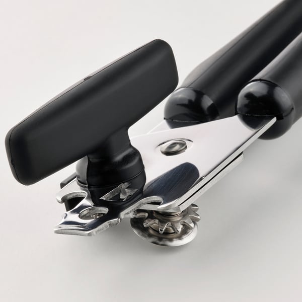 Can opener with black handles. Stainless steel body. Designed for secure grip.