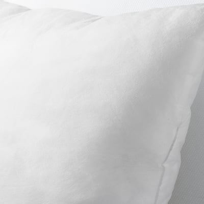 Soft, plush white indoor cushion, showcasing high-quality fabric and plush filling.