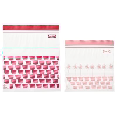Two IKEA ISTAD resealable bags in red and light pink with flower and cup designs on transparent material.