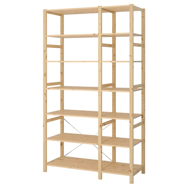 IVAR pine bookshelf, six empty shelves, rectangular frame, natural wood finish, sturdy and minimalist design.