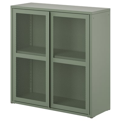 A green IVAR mesh cabinet with sliding doors and a perforated design. Its made of steel and epoxy coating.