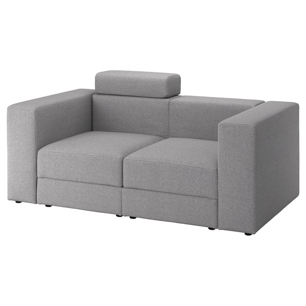 Grey modular sofa, comfy, versatile.