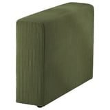 Green corduroy sofa cover, rectangular, textured, dark environment.