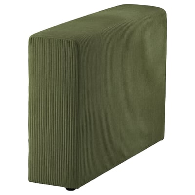 Green corduroy sofa cover, rectangular, textured, dark environment.