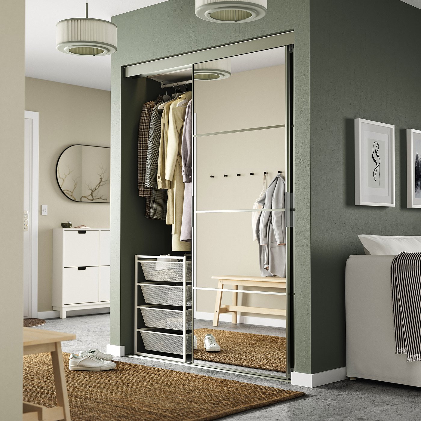 JONAXEL steel storage with mirror door in room, organising clothes neatly.