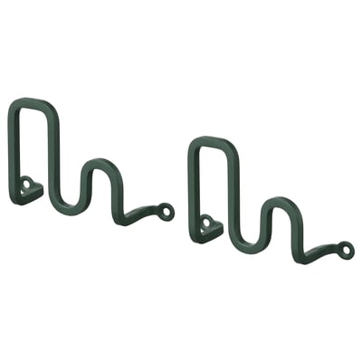 Two dark green, wavy-shaped hooks, positioned side by side, with small circular holes for mounting; stylish and functional.