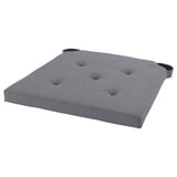 A grey JUSTINA chair cushion with tufted design, cotton material, and hook-and-loop fasteners for secure placement.