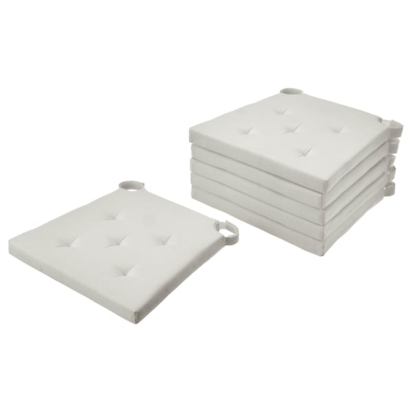 Image shows stack of 5 white JUSTINA chair cushions, rectangular, padded, with loop fasteners.