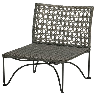 Black wicker chair with curved legs and intricate back design.