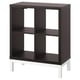 KALLAX black cube storage unit. Four open compartments. White legs. Modern, minimalist design.