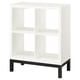 A KALLAX white shelf unit with a black base. It has four open cube compartments, designed for storage and display.