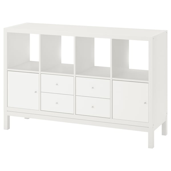 An a white ikea KALLAX shelf unit with drawers and open spaces.