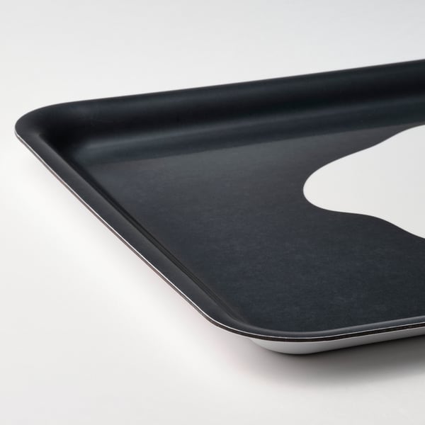 Black rectangular tray with curved edges, made of high-pressure melamine laminate. Suitable for carrying items and doubling as wall decor.