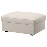 A KIVIK footstool in beige, featuring a square, cushioned design with a removable, machine-washable cover made from recycled polyester and cotton.