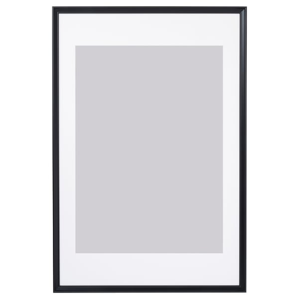 Black picture frame with white mat, suitable for wall or table display, has thin edge and plastic front protection.