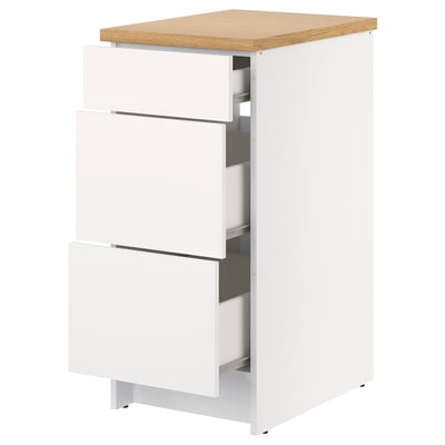 White KNOXHULT kitchen base cabinet with oak top and three drawers.