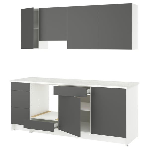 Modern gray & white kitchen cabinets with drawers, doors, shelves.