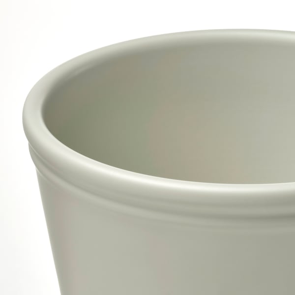 Close-up of. KÖRSBÄRSBJÖRK plant pots smooth, white, durable earthenware surface.