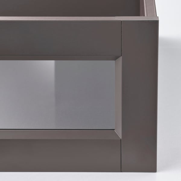 Dark grey glass-fronted drawer, part of the KOMPLEMENT series, shown in close-up with sleek, modern design.