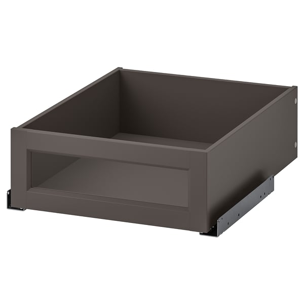 An open dark grey KOMPLEMENT framed glass drawer, part of a furniture line offering storage solutions, combining tempered glass and dark grey paint.