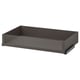 An empty, dark grey KOMPLEMENT drawer with glass front, rectangular shape, and sleek design.