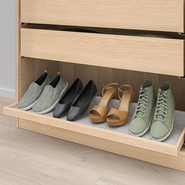 Wooden drawer with 4 pairs of shoes from IKEA KOMPLEMENT series.