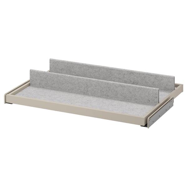 KOMPLEMENT beige pull-out tray. Made of fibreboard and plastic, filled with grey felt.