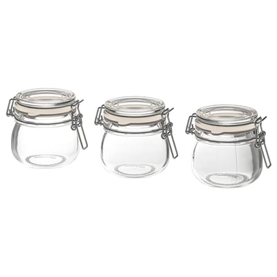 Three clear glass KORKEN jars with metal clamps and rubber seals, arranged in a row.