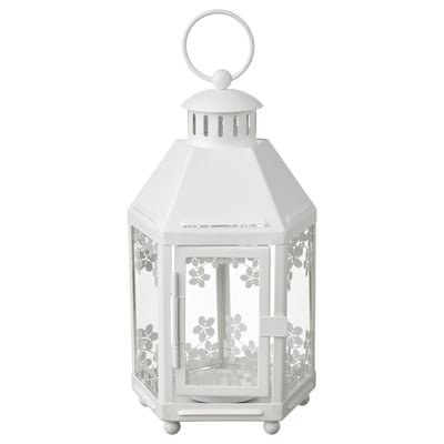 White KRINGSYNT lantern. Hexagonal shape with floral glass design. Hangs or stands, made of steel and glass.
