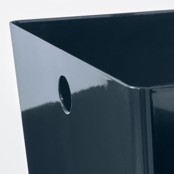 Square, dark-colored organiser box with smooth, glossy finish. Single cutout handle on side, crafted from recycled pet plastic.