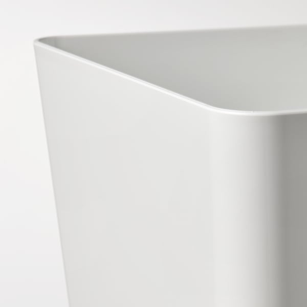 Close-up of a pristine white KUGGIS boxs edge, showcasing smooth, high-quality plastic finish.