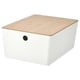 A white KUGGIS storage box with a light wooden lid, featuring a black circular handle and a sleek, modern design.