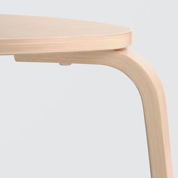 Light wooden stool with smooth, curved legs and a simple, round seat. High-quality finish and sturdy design.