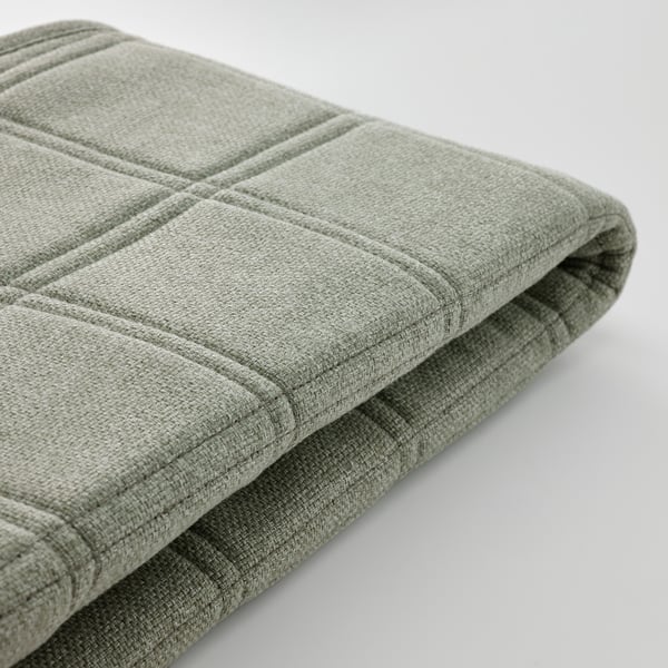 Folded grey fabric, soft texture, neat stitching, recycled material.