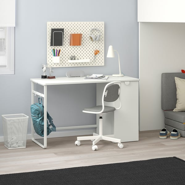 LÄRANDE white kids desk setup with grey chair, lamp, and pegboard, perfect for small rooms.