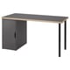 LAGKAPTEN desk in black with light wood trim. Rectangular with four black legs.