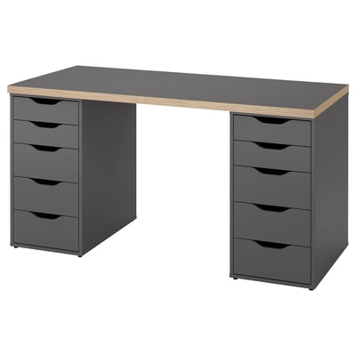 Black LAGKAPTEN desk with honeycomb edge, drawers, and plain top.