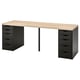 LAGKAPTEN desk in light oak with black accents and two drawer units.