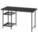 LAGKAPTEN desk in black with metal grid shelves, rectangular shape, minimalist design.