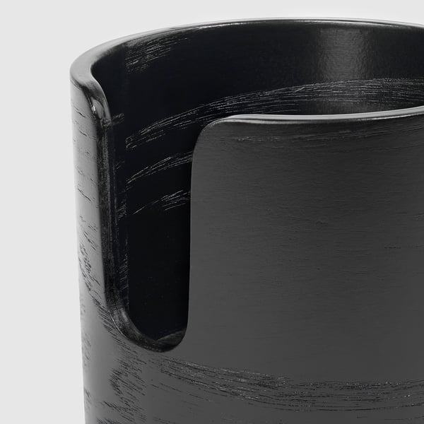 Black mug holder with sturdy clamp, smooth finish, and ergonomic front cutout for easy grip.