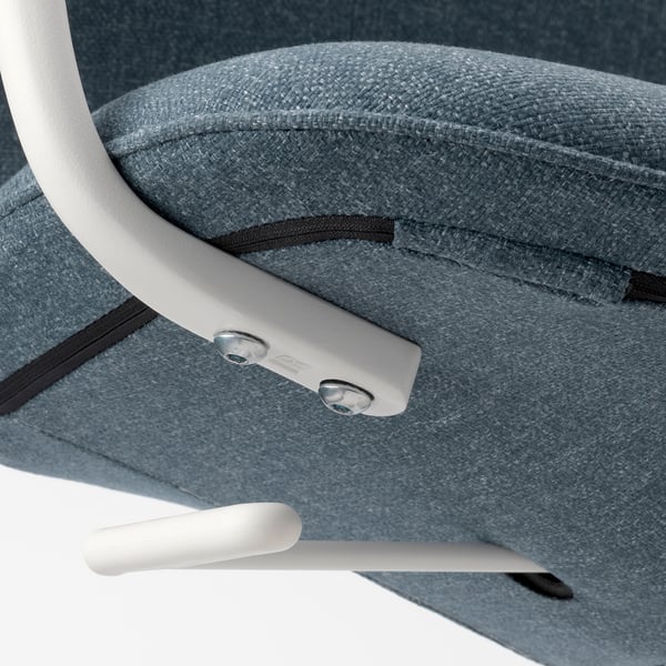 Close-up of modern office chairs seat and armrest, showing durable materials and high-quality stitching.