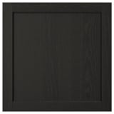 Dark wood cabinet door with bevelled edges.