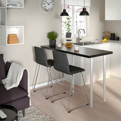 Modern kitchen with grey LILLÅNÄS stools, padded seats, chrome legs, white countertop, and clean decor.